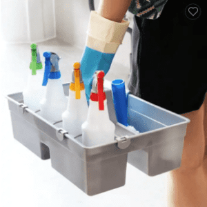 A woman holding a Utility Caddy in a plastic tray.