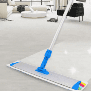 A Flat-Head Mop with a blue handle in a living room.